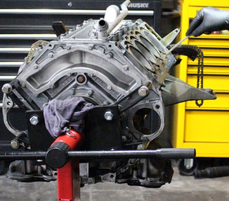 BMW engine on a stand during an engine repair